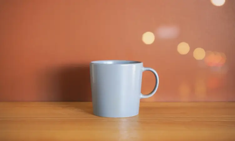 Traditional beer mug filled with frothy craft beer