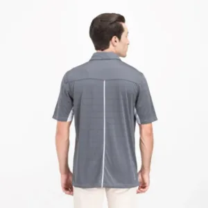 Rear view of a man wearing the Elevate polo highlighting the seamless shoulder design and moisture-management ventilation.