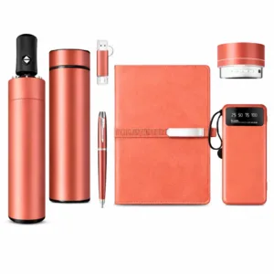 Premium business gift set with USB drive, pen, notebook, and thermos arranged for branding