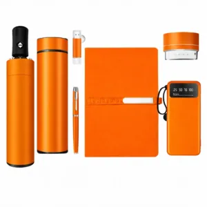 Close-up of premium business gift box highlighting logo printing on notebook and pen