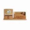 Handcrafted wooden desk organizer with clock and pen holder for home office or study desk.